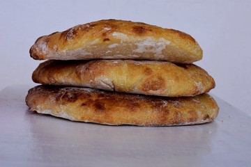 Freshly baked homemade bread/ Traditional Balkan cuisine/ Somun/ Bread for meatballs/ Lepinja