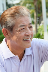 Man smiling while enjoying the beautiful view