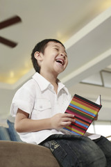 Boy reading book