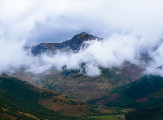 Scottish mountains with clouds. 
the picture was taken while climbing to the highest scottish peak - Ben Nevis