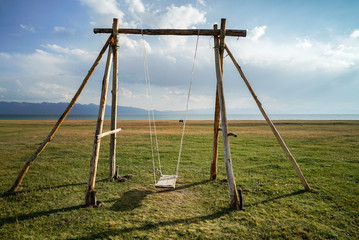 Wooden swing at Song Kul Lake, Kyrgyzstan - 351463018
