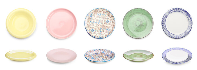 Set of different clean plates on white background