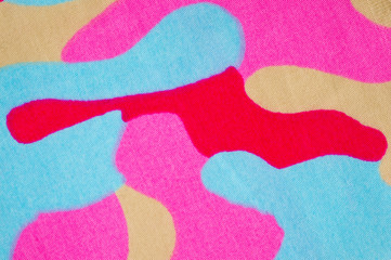 Tight cotton with a bright summer print, photographed close-up.