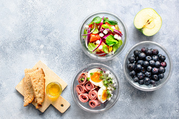 Organic homemade salad in glass bowls