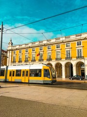 Fototapeta na wymiar yellow tram in the city