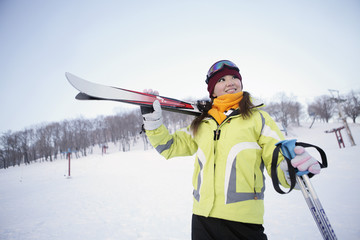 Fototapeta na wymiar Woman with skis