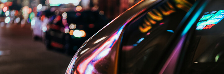 Car in a city at night