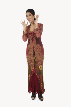 Surprised Woman In Baju Kebaya With Hands Opened