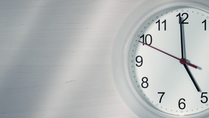 Clock ticking showing five hours