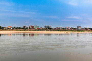 Fototapeta na wymiar View of the Mekong River separating the Thai-Laos border At Si Chiang Mai District, Nong Khai, Thailand, across from Vientiane Capital, Laos