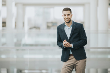 Elegant, young student preparing for his first job interview in a start-up company