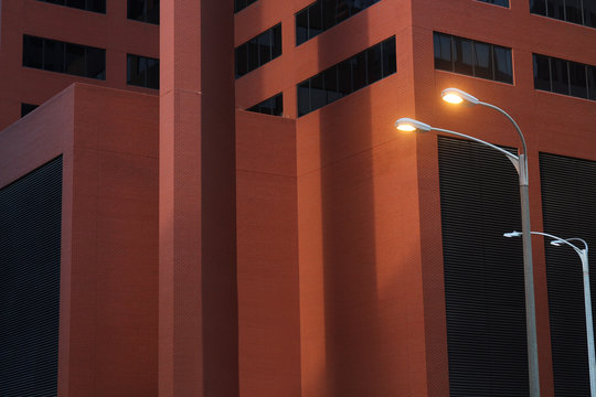 Beautiful Red Modern Building With Street Lamp