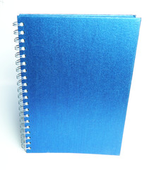 Blank cover of blue notebook on white background