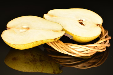 Juicy sweet, organic pears, close-up, on a black background.