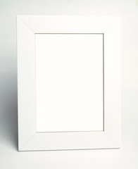 Blank white picture frame on white background