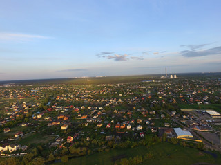 Aerial view of the saburb landscape (drone image). Near Kiev. Sunset time.