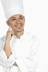 Asian chef thinking