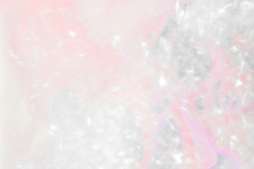 Fototapeta na wymiar Light reflecting a pink surface background