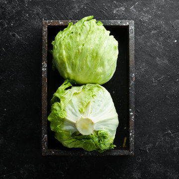 Iceberg Lettuce In A Wooden Box. Top View. Free Copy Space.