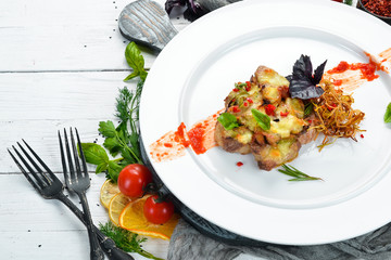 Baked pork steak with cheese. Dishes, food. Top view. Free space for your text.