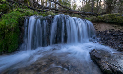 Fototapeta premium View of forest waterfall, deep forest waterfall landscape.