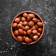 Hazelnuts in a bowl. Nut. Top view.