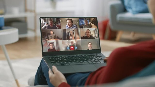 Home Office: Woman Uses Laptop Computer with Conference Video Call App to Chat With Friends, Relatives and Coworkers