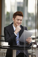 Businessman using digital tablet