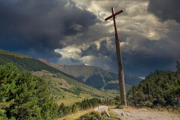 Christian cross on the road to montgarri from the valley of aran