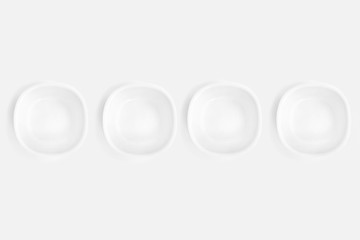 White plates on a white background