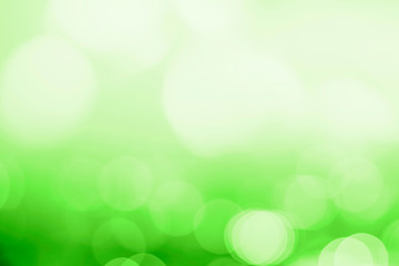 Obraz premium Bokeh pattern on a green background