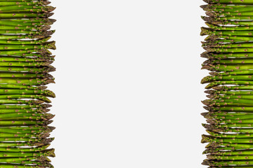 Green asparagus on a white background.