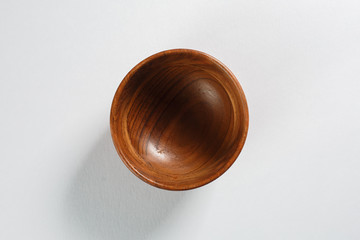 wooden bowl on white background