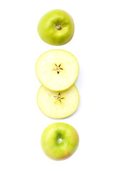 Green juicy apple sliced isolated on a white background