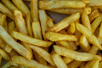 Close-up of French fries as a background.