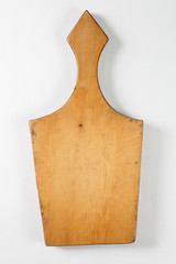 Brown board for slicing food on a white background
