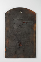 Burnt board for food on a white background