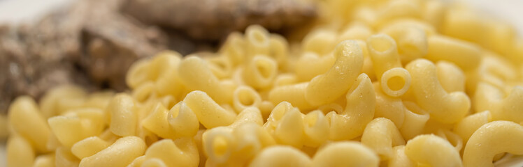 Chicken liver and pasta dish in a bowl