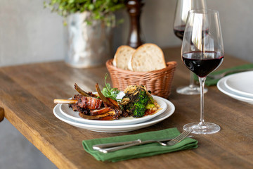 meat in a plate on a wooden table