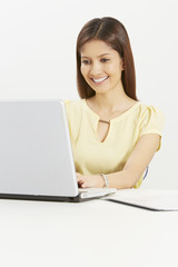 Businesswoman working on the laptop