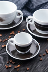 black cups on black background