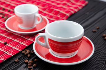 Red coffee cup on black background