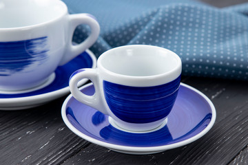 blue cups on a gray background