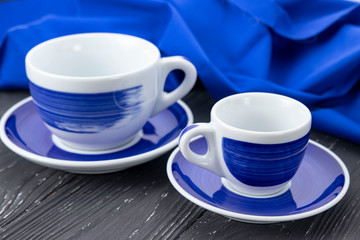 blue cups on a gray background