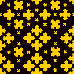 Pattern yellow different crosses on black background.