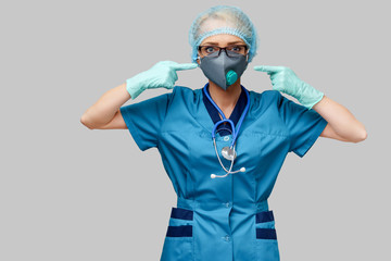 female doctor with stethoscope wearing protective mask and latex gloves over light grey background