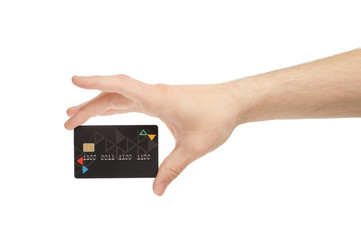 Close up of a hand holding a black credit card on a white background.