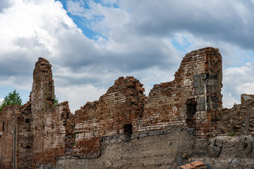 The ruins of the houses. Brick walls