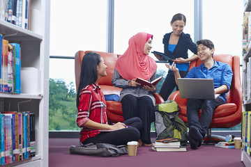 Students having study group in library