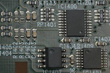 Close up a  IC electronic components solder on a board.
